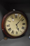 A Victorian mahogany cased station style wall clock, having Roman hours to the chapter ring