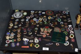 A good selection of vintage enamel pin badges of crown green bowling interest.