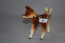 A vintage mid century Disney (Japan) porcelain figure of Bambi, marked to underside