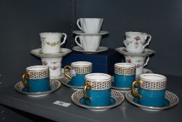 A group of five New Chelsea coffee cans and saucers, together with four Collingwoods cans and