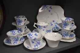 An attractive Colclough Bone China part teaset, decorated with forget me nots, hairlines showing
