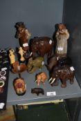 A selection of wooden carved figure and animal studies including Elephant and Bison.