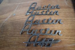 Five vintage car bonnet/ boot name badges, of Austin interest.