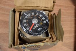 A vintage speedometer, SN/3233/00.