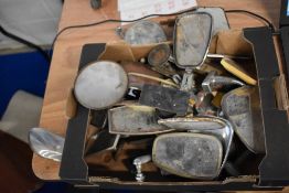 A box of various vintage mirrors, including wing and rear view mirrors, some AF.