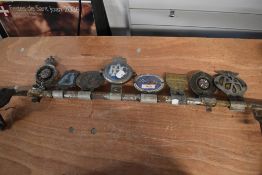 A collection of vintage Motoring badges, including club badges, AA, RAC and more.