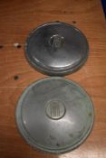 Two Fiat hub caps, possibly 1300.