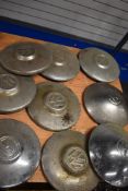 A collection of various Volkswagen hub caps.