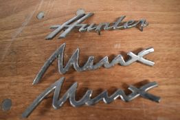 Three vintage car bonnet/ boot name badges, of Hillman interest.