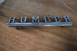 Four vintage car bonnet/ boot name badges, including Humber, VW, Gazelle and Riley, Riley badge AF.