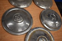 Five Morris hub caps.