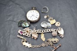 A selection of HM silver and white metal stamped 925/silver including small pocket watch, charm