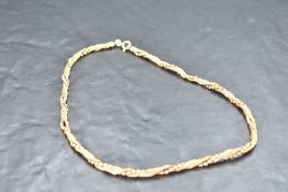 An 18ct gold twist chain having ball link and plaited twist detail, approx 16' & 24.7g