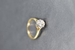 A diamond solitaire ring, approx 0.55ct in an illusionary setting to knife blade shoulders on an