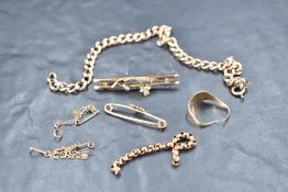 A small selection of 9ct gold and yellow metal broken jewllery, approx 12g