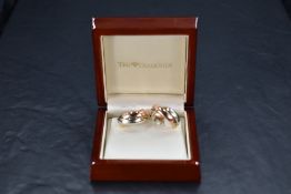 A pair of 9ct tri colour gold Russian wedding ring style hoop hearrings, approx 17g
