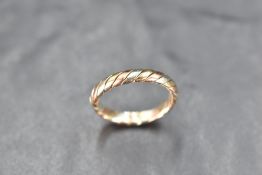 A 9ct gold tri-colour ring, of rope-twist form, marked 375, ring size N, 3grams