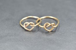 Two 9ct gold wire rings haveing heart detail, sizes M & P, approx 2.5g gross