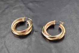 A pair of 9ct gold triple hoop earrings, approx 7g