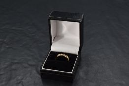 A six stone diamond half eternity ring having six brilliant cut diamonds, total approx 0.35ct all in