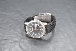 A gent's Wenger 7016X wrist watch having Arabic numeral dial with perimeter seconds dial and date