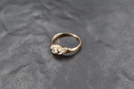 An oval aqua marine ring having diamond chip set shoulders on a 9ct gold loop, size M & approx 1.4g