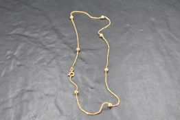 A 9ct gold box link chain with spherical decoration, approx 18' & 5.4g