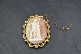 A conch shell cameo brooch depicting Venus & Mars modelled after a similar sculpture by Antonio
