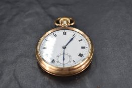 A gold plated top wound pocket watch having Roman numeral dial with subsidiary seconds to white face