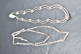 A silver double link chain having box clasp, approx 16' and a white metal chain having moulded