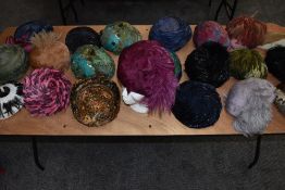 A varied lot of twenty vintage feather hats, varying styles, sizes and eras, some very flamboyant