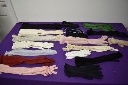 A collection of vintage gloves, various styles, eras and sizes.