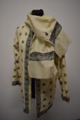 A scarce 1940s wool coat and matching shawl (kashmiri?) having extensive embroidery throughout,
