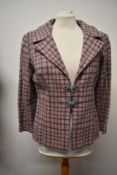 A 1940s/50s pink and grey checked wool jacket, having frog fastening.