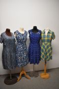 A 1940s blue and yellow checked dress (historically shortened) a blue 1950s Polka dot cotton