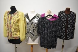 A selection of 1980s beaded and sequinned tops and a jacket.