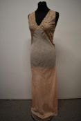 A 1930s full length bias cut floral silk nightdress having lace bodice.