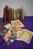A box full of books of needlecraft interest.