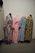 A collection of vintage nightwear comprising; two 1960s housecoats, a 1970s candlewick dressing
