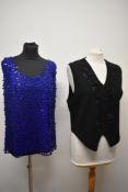 A 1960s blue wool top with extensive sequin detailing and a 1960s black waistcoat with beadwork to