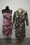 A late 1940s floral dress with matching jacket and a late 1950s cotton dress with faux sarong skirt,
