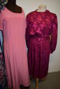 Three retro dresses, including floral 1980s and pink Laura Ashley.