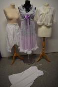 A mixed lot of vintage underwear, to include Victoria bloomers, lace trimmed petticoat, 1960s bed