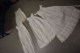 Four Victorian and Edwardian infants gowns.