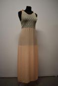 A 1930s/40s pale pink nightdress, having embroidered tulle lace bodice and tie straps to shoulders.
