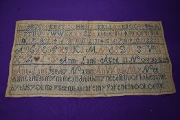 A Georgian alphabetical sampler, dated Nov 30th, 1824, worked by Ann Lang, aged 11.