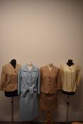 A mixed lot of 1950s and 60s suits and jackets, including 1950s fawn coloured linen jacket and