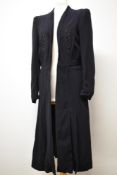 A 1930s navy blue wool crepe coat, having appliqué leaf design to bodice and piped detailing to