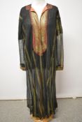 A 1920s/30s black, gold and red Tulle Bi Telli dress, having full length sleeves, low neckline and