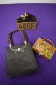 Three vintage handbags, comprising; 1960s snakeskin bag with clasp to fastening, Indian suede and